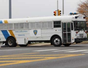 A bus leaves the correctional complex on State Road in Philadelphia. (Emma Lee/for NewsWorks)