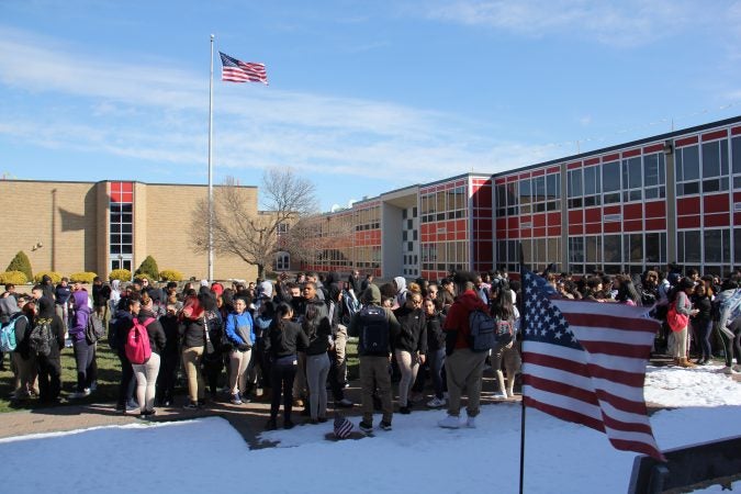 About 600 Pennsauken High students, nearly half the school, participate in a walkout to remember the Parkland school shooting victims.