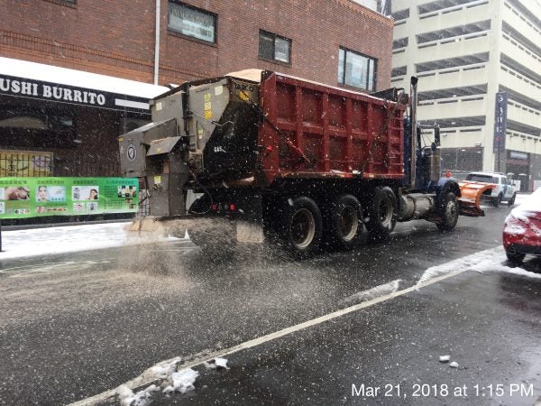 A sand truck heading south on 10th St. near Arch in Chinatown (Alan Tu/WHYY)