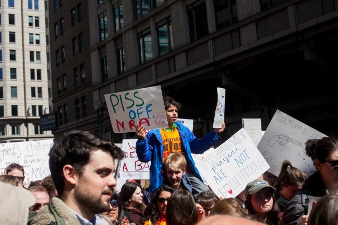 Demonstrators flood 12th Street in downtown Washington D.C during the March for Our Lives Saturday afternoon. (Brad Larrison for WHYY)