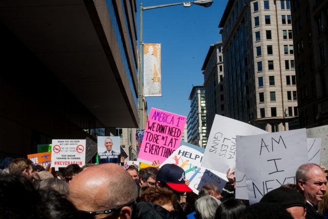 Demonstrators flood 12th Street in downtown Washington D.C during the March for Our Lives Saturday afternoon. (Brad Larrison for WHYY)