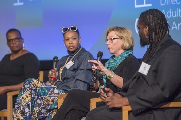 Marci Hamilton addresses questions from audience members during a panel discussion on workplace harassment and the #MeToo movement. From left are Annette John-Hall, Lynette Medley, Marci Hamilton and Michael O'Bryan. (Jonathan Wilson/for WHYY)