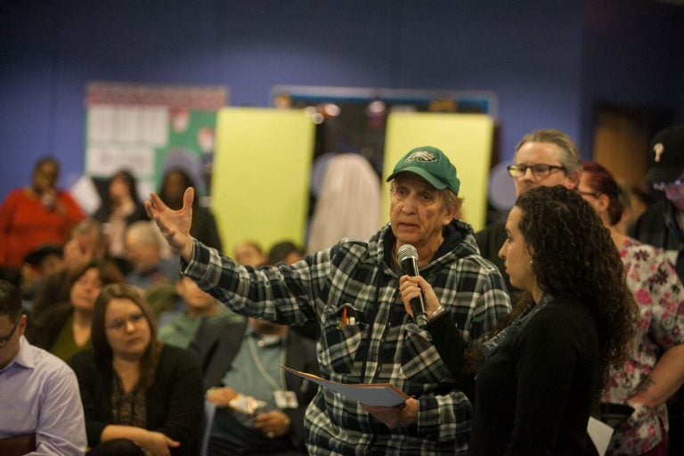 A Kensington resident speaks during a forum on opioid overdoses and a proposed supervised injection facility. City officials have not selected a location yet, but it's expected to be put in Kensington. (Brad Larrison for WHYY)