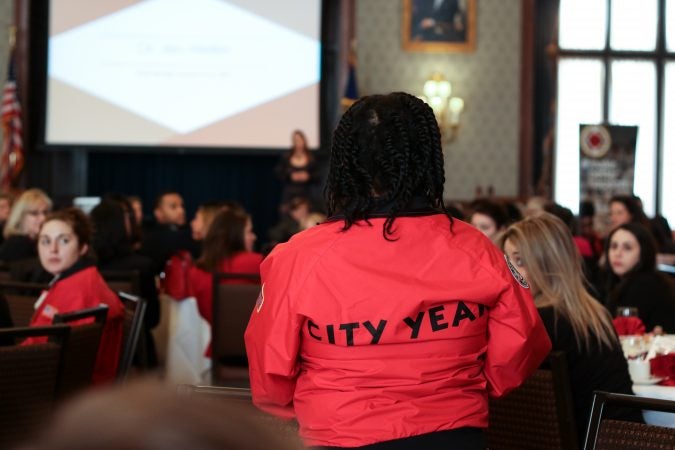 Jen Welter, the first woman to join an NFL team's coaching staff, addressed the crowd at a Women’s Leadership Luncheon hosted by City Year Philadelphia (Angela Gervasi/for WHYY)