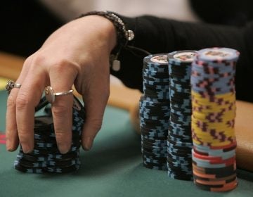 Professional poker player Annie Duke shuffles her chips during the US$50,000 buy-in HORSE event of World Series of Poker at the Rio hotel-casino in Las Vegas, Monday, June 25, 2007.  (AP Photo/Jae C. Hong)