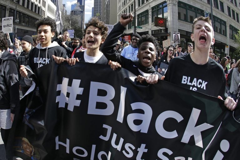 Young protesters take part in a Black Lives Matter march