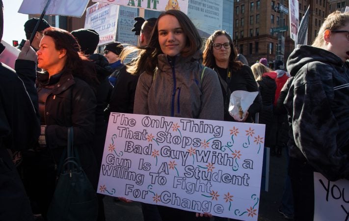 Lila Smith, 14, from New Jersey, takes a stand at the Philadelphia March for Our Lives, March 24, 2018. (Emily Cohen for WHYY)