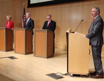 Pennsylvania GOP gubernatorial candidates debate at the National Constitution Center. They are (from left) Laura Ellsworth, Paul Mango, and state Sen. Scott Wagner. WHYY senior reporter Dave Davies (right) was moderator, (Emma Lee/WHYY) 