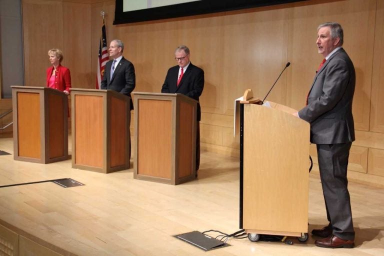 Pennsylvania GOP gubernatorial candidates debate at the National Constitution Center. They are (from left) Laura Ellsworth, Paul Mango, and state Sen. Scott Wagner. WHYY senior reporter Dave Davies (right) was moderator, (Emma Lee/WHYY) 