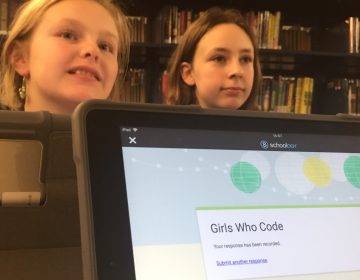 More than 50 students at Alfred G. Waters Middle School near Middletown participate in the Girls Who Code club. (Cris Barrish/WHYY)