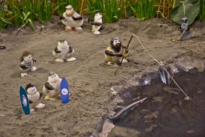 Shell people enjoy a beach day as part of the Camden’s Children’s Garden Flower Show display. (Kimberly Paynter/WHYY)