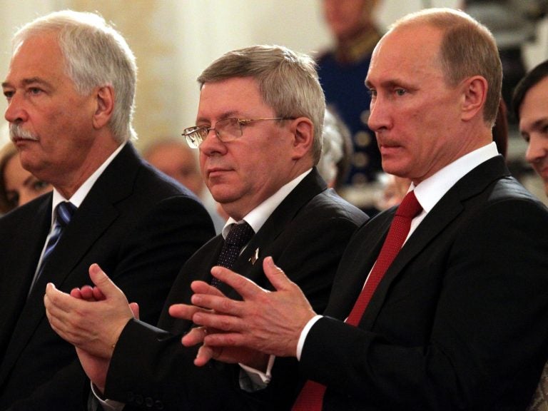 Russian politician Alexander Torshin, standing next to then-Russian prime minister Vladimir Putin, attends a ceremony at the Kremlin in 2011. Torshin is a lifetime member of the National Rifle Association, and says he met Donald Trump through the group in 2015. (Konstantin Zavrazhin/Getty Images)
