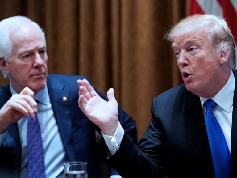 President Trump speaks, watched by Sen. John Cornyn, R-Texas, during a bipartisan meeting with members of Congress on school and community safety at the White House on Wednesday. (Mandel Ngan/AFP/Getty Images)