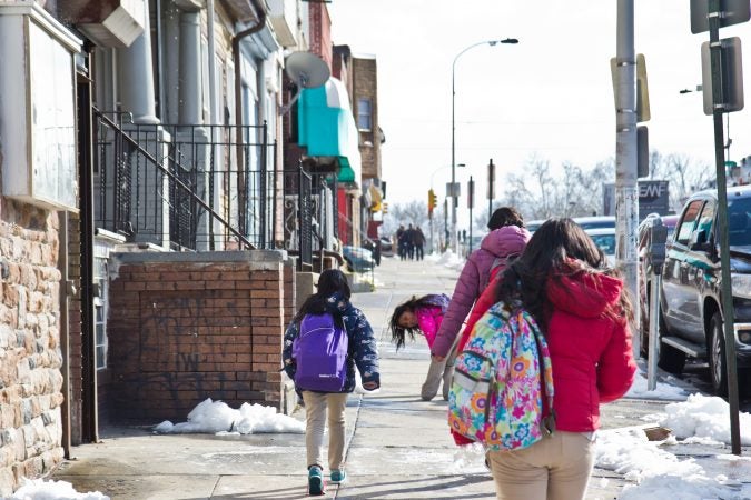 Students walk home after school on 5th Street in Olney. (Kimberly Paynter/WHYY)