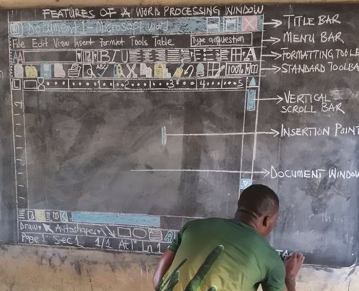 Owura Kwadwo Hottish illustrates a window of Microsoft Word using colored chalk on a blackboard. He uses it to teach computer skills to students at the Betenase M/A Junior High School in Kumasi, Ghana. (Frimpong Innocent)