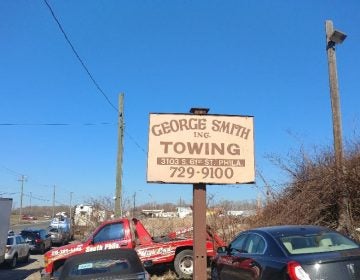 Sign outside George Smith Towing in Southwest Philadelphia (Tom MacDonald, WHYY)