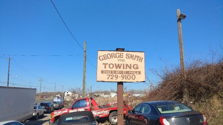 Sign outside George Smith Towing in Southwest Philadelphia (Tom MacDonald, WHYY)