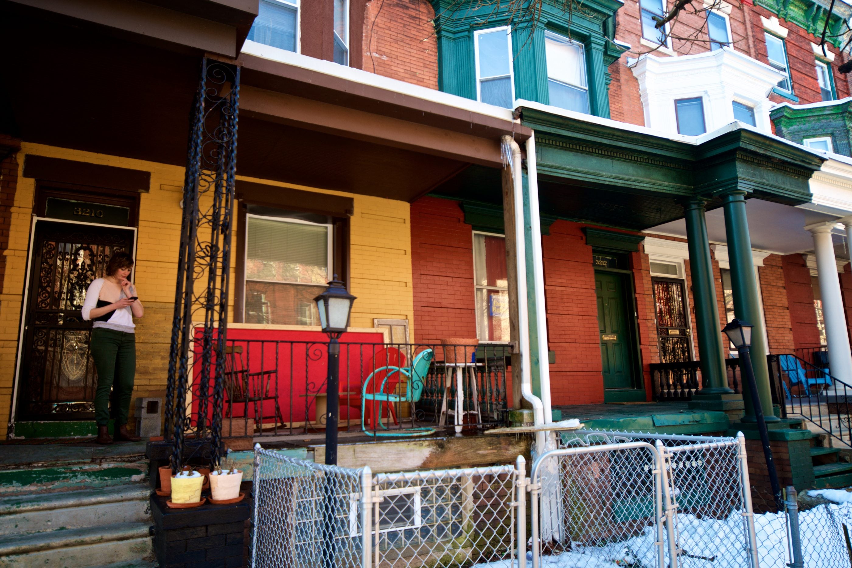 Writer Jen Kinney on her Strawberry Mansion porch.