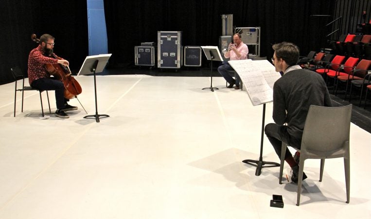 Erwachen (Awakening) for trumpet, cello, and soprano saxophone is rehearsed by (from left) Eric Coyne, Joe Drew, and Aaron Stewart. (Emma Lee/WHYY)