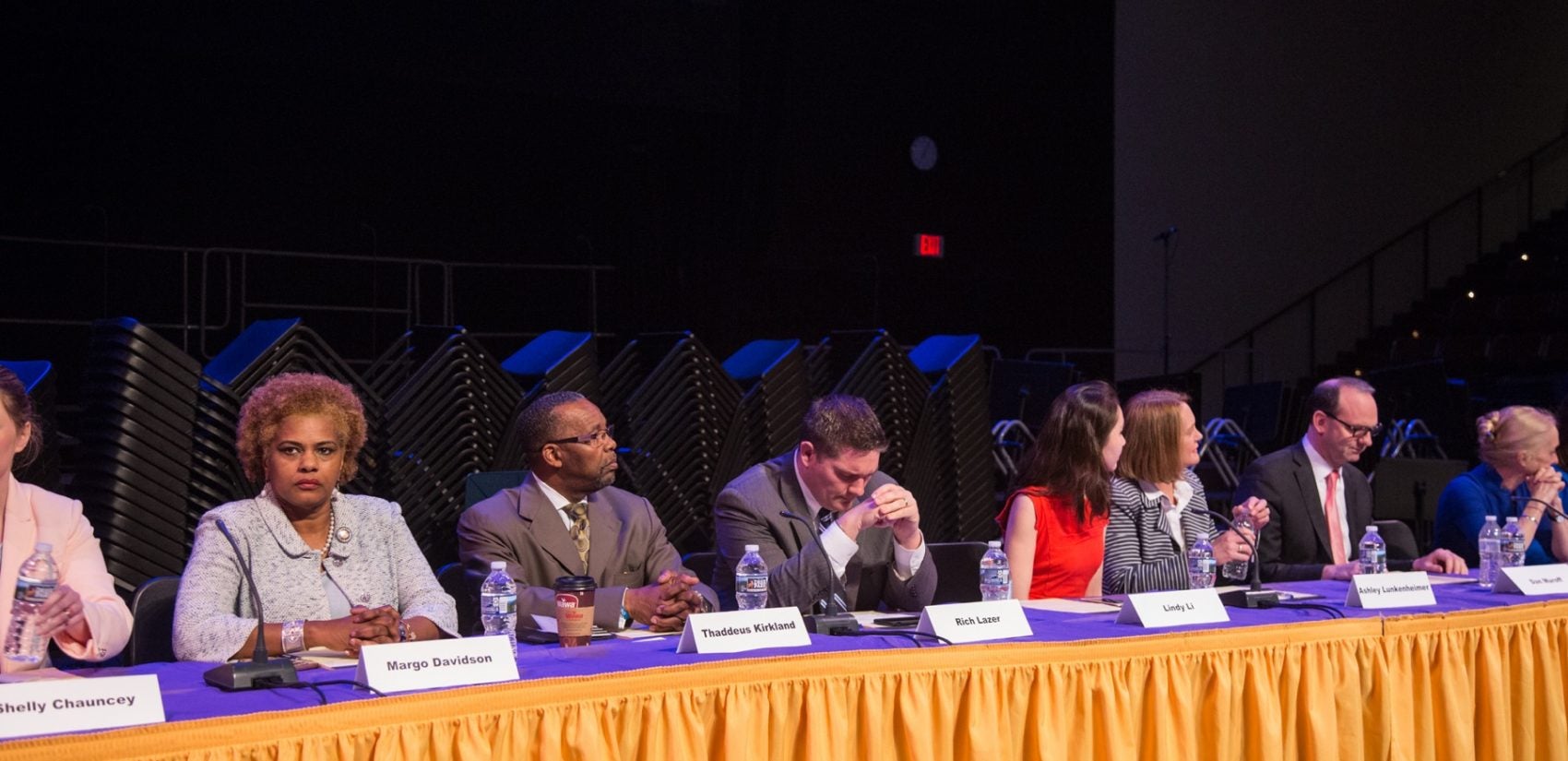 Thirteen of the 14 Democratic candidates for Pennsylvania's newly drawn 5th Congressional District debate at Upper Darby High School.