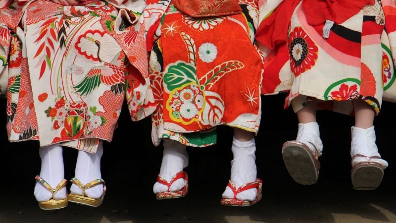 Students from the Japanese Language School of Philadelphia wait to play their part in the opening ceremony for the Cherry Blossom Festival at the Japanese House and Garden in Fairmount Park. (Emma Lee/WHYY)