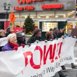 Demonstrators march  toward City Hall in response to an incident last week where two black men were arrested in a Center City Starbucks. (Brad Larrison for WHYY)