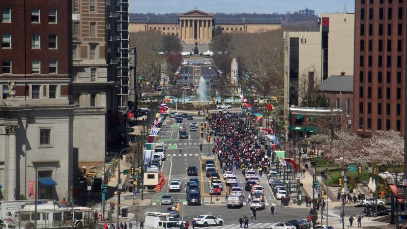 Students march on the Ben Franklin Parkway from City Hall to Logan Square, part of a national day of protest against gun violence on the 19th anniversary of the Columbine school shooting. (Emma Lee/WHYY)