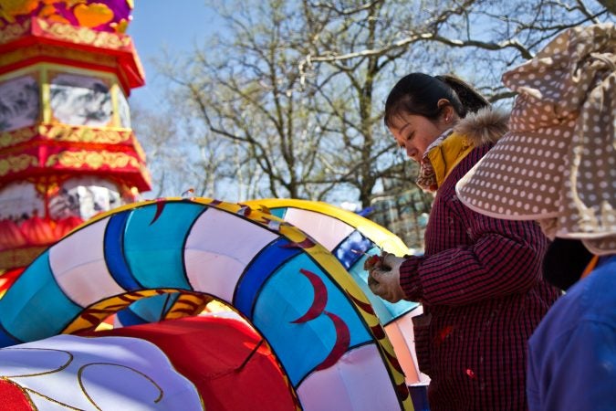 Twenty Chinese artisans spent a month creating the wire and silk structures, then painting them. (Kimberly Paynter/WHYY)