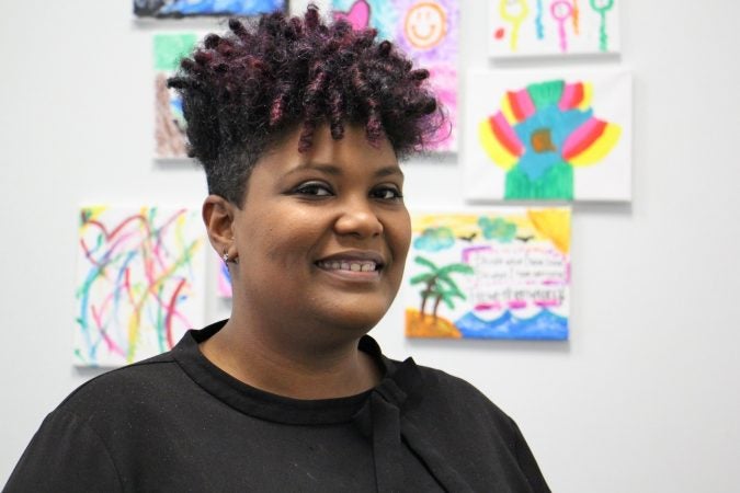 Natalie Dallard, project manager at Joseph J. Peters Institute, works to provide trauma therapy to children in North Philadelphia. (Emma Lee/WHYY)
