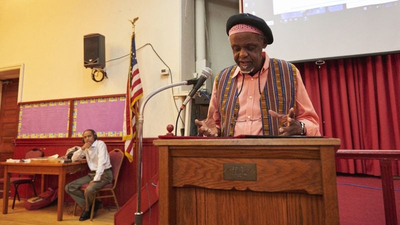 Mother Bethel AME Chaplain Mahdi ibn Ziyad delivers a speech of unity. (Natalie Piserchio for WHYY)