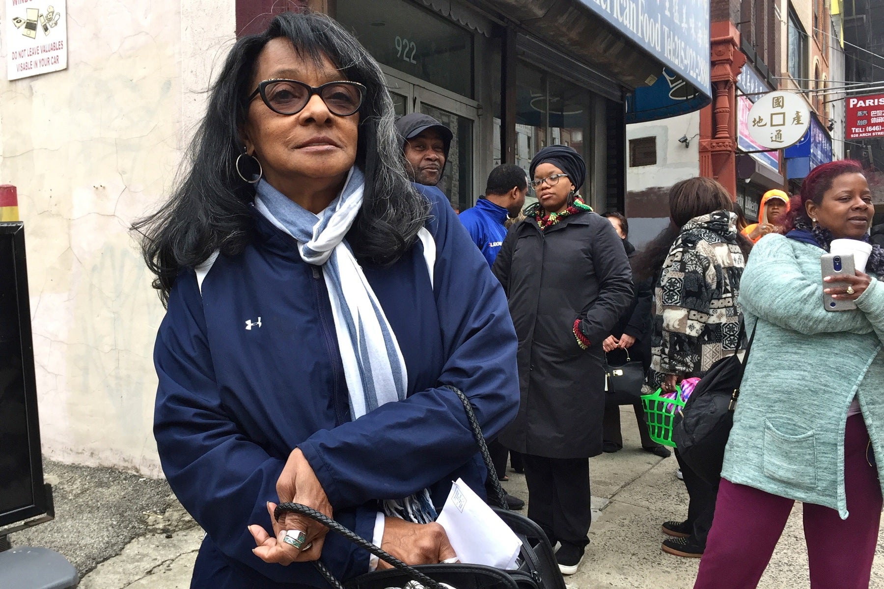 Joy Lipscomb waits in line to pay her parking tickets on the last day of amnesty.