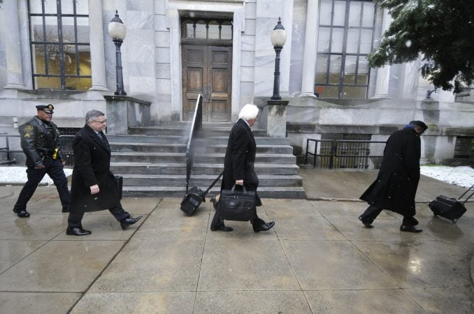 Bill Cosby's legal defense team, including attorneys Tom Mesereau and Kathleen Bliss, arrive at the Courthouse in Norristown, PA on Monday, April 2, 2018. (Bastiaan Slabbers for WHYY)