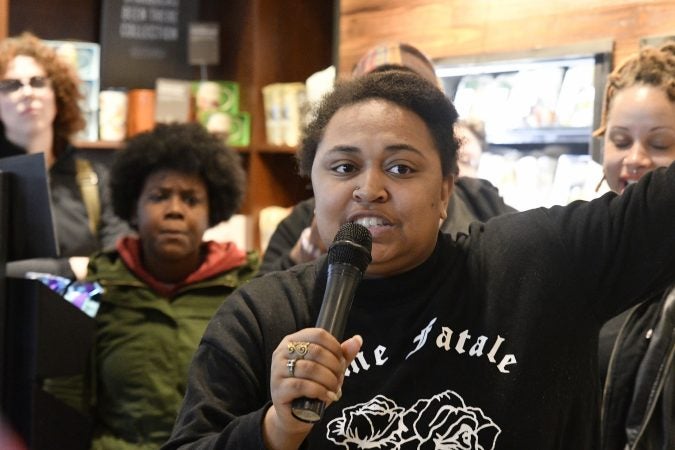 An estimated 50 gathered inside the Starbucks near Rittenhouse Square on Monday morning to protest the recent arrest at that location. (Bastiaan Slabbers for WHYY)