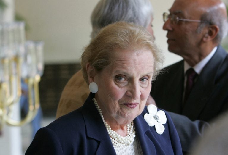 Former U.S. Secretary of State Madeleine Albright arrives to address an interactive session on "America, India and Democracy in the 21st Century" in New Delhi, India, Tuesday, Sept. 5, 2006. The session was organized by The Aspen Institute India and Confederation of Indian Industry. Also seen background right is President of The Aspen Institute India Tarun Das. (AP Photo/Gurinder Osan)