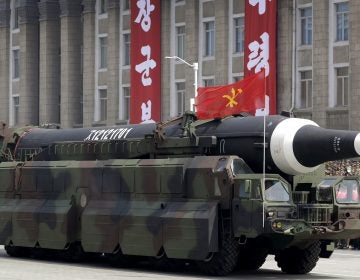 FILE - In this April 15, 2017, file photo, an unidentified missile that analysts believe could be the North Korean Hwasong 12 is paraded in Kim Il Sung Square in Pyongyang, North Korea. Many analysts believe the missile could be a stepping stone to the ICBM North Korea needs to attack the U.S. mainland. (AP Photo/Wong Maye-E, File)