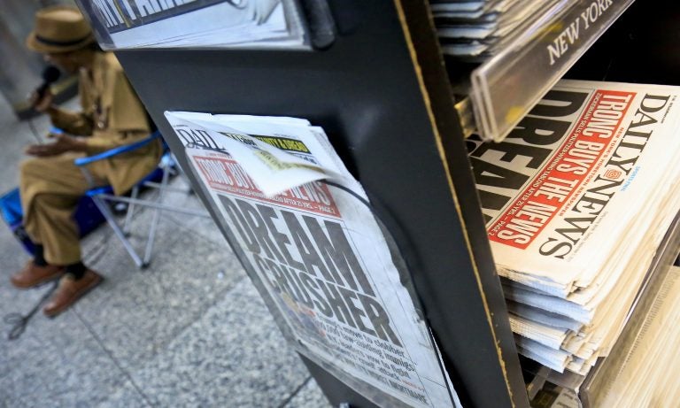 A news stand display copies of the Daily News, Tuesday Sept. 5, 2017, in New York.