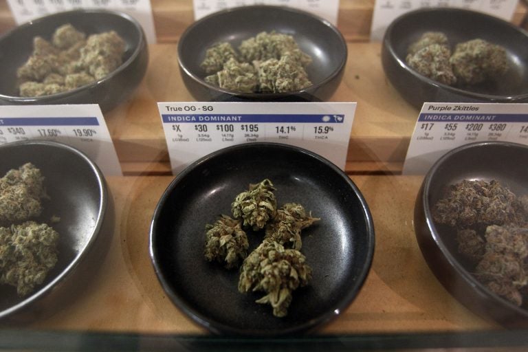 Different types of marijuana sit on display at Harborside marijuana dispensary, Monday, Jan. 1, 2018, in Oakland, Calif. Starting New Year's Day, recreational marijuana can be sold legally in California. (Mathew Sumner/AP Photo)