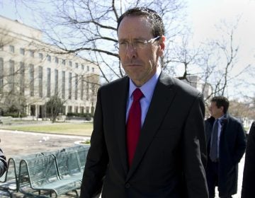 AT&T CEO Randall Stephenson leaves the federal courthouse Thursday, March 22, 2018, in Washington.