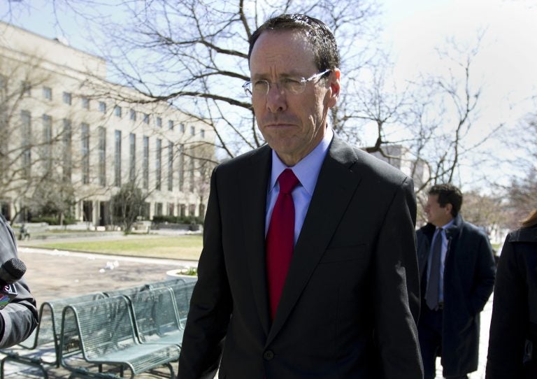 AT&T CEO Randall Stephenson leaves the federal courthouse Thursday, March 22, 2018, in Washington.