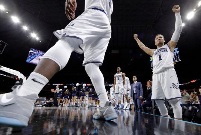 Villanova's Jalen Brunson (1) and players on Villanova bench react during the second half in the championship game of the Final Four NCAA college basketball tournament against Michigan, Monday, April 2, 2018, in San Antonio. (AP Photo/David J. Phillip)