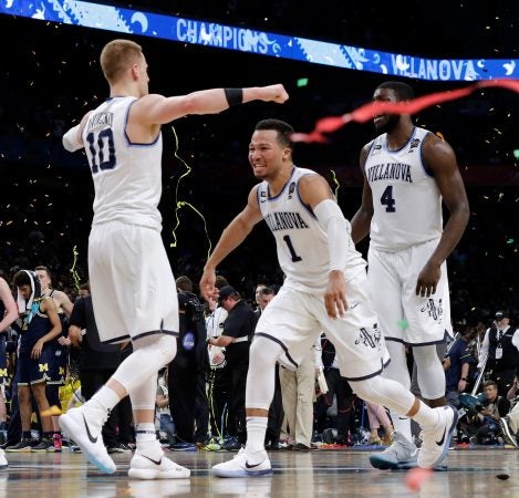 Villanova's Donte DiVincenzo (10) and Jalen Brunson (1) celerbate after the championship game of the Final Four NCAA college basketball tournament against Michigan, Monday, April 2, 2018, in San Antonio. Villanova won 79-62. (AP Photo/David J. Phillip)