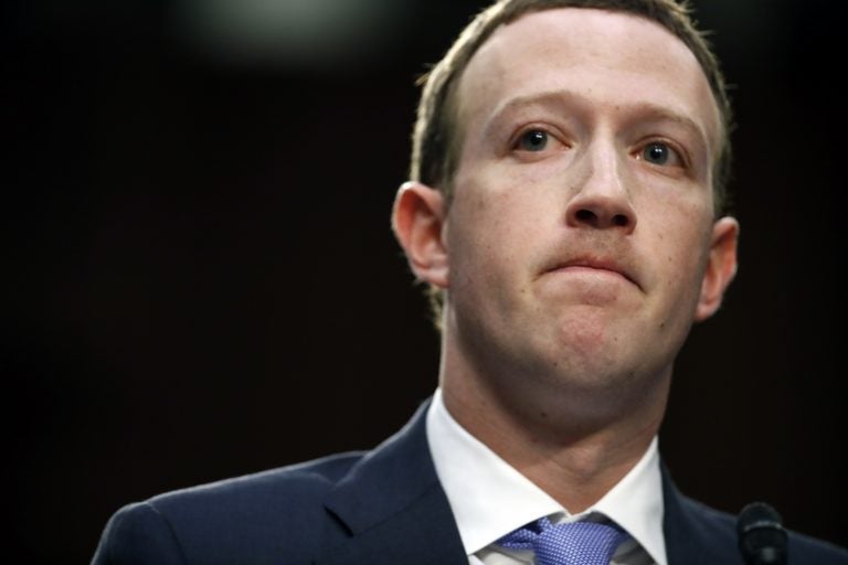 Facebook CEO Mark Zuckerberg pauses while speaking as he testifies before a joint hearing of the Commerce and Judiciary Committees on Capitol Hill in Washington, Tuesday, April 10, 2018