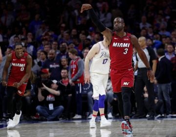 Miami Heat's Dwyane Wade reacts to his basket in the last minute of the second half in Game 2 of a first-round NBA basketball playoff series against the Philadelphia 76ers, Monday, April 16, 2018, in Philadelphia. The Heat won 113-103. (AP Photo/Chris Szagola)