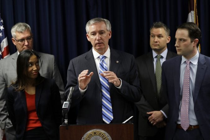District Attorney Kevin Steele, right, speaks at a news conference after Bill Cosby was found guilty in his sexual assault trial, Thursday, April 26, 2018, in Norristown, Pa. Cosby stared straight ahead as the verdict was read but moments later lashed out loudly at Steele after the prosecutor demanded Cosby be sent immediately to jail. Steele told the judge Cosby has an airplane and might flee. (AP Photo/Matt Slocum)