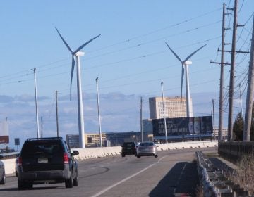 Cars drive past windmills on the grounds of a sewage treatment plant in Atlantic City, N.J. on Monday Jan. 4, 2016. (Wayne Parry/AP Photo)