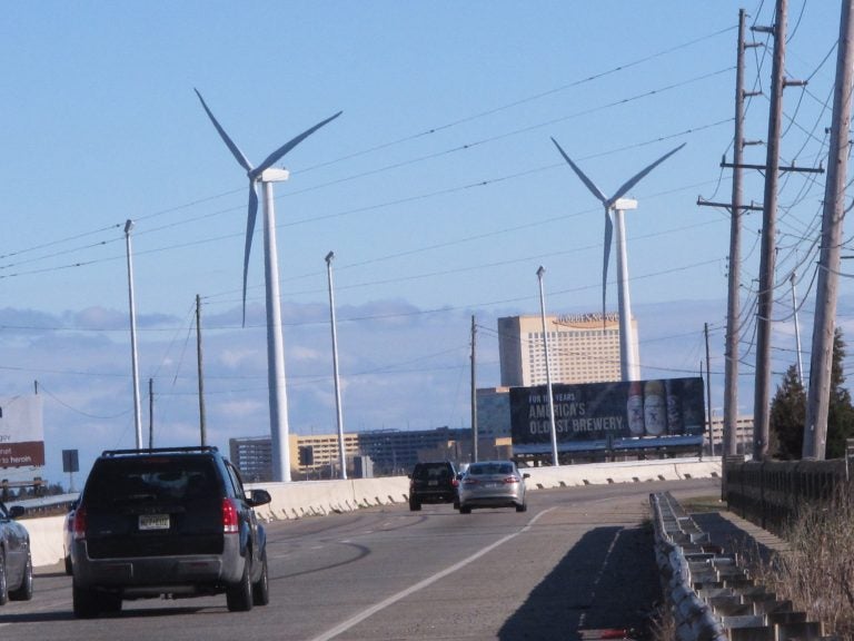 Cars drive past windmills on the grounds of a sewage treatment plant in Atlantic City, N.J. on Monday Jan. 4, 2016. (Wayne Parry/AP Photo)