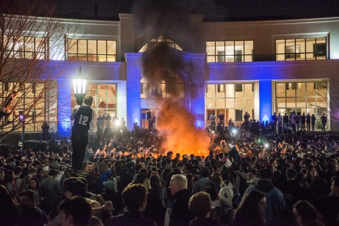 Villanova studetns celebrate the men's basketball team victory in the NCAA championship. (Branden Eastwood for WHYY)