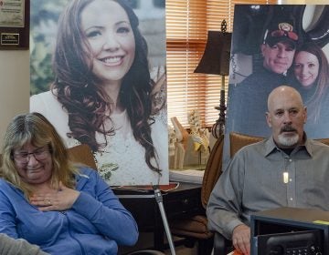 Carol McDowell gets emotional as she and Kevin McDowell sit in front of photos of their daughter Kelly Ann McDowell during a press conference. McDowell killed herself with the service revolver of her boyfriend, Ventnor Police Sgt. Frank O'Neill.