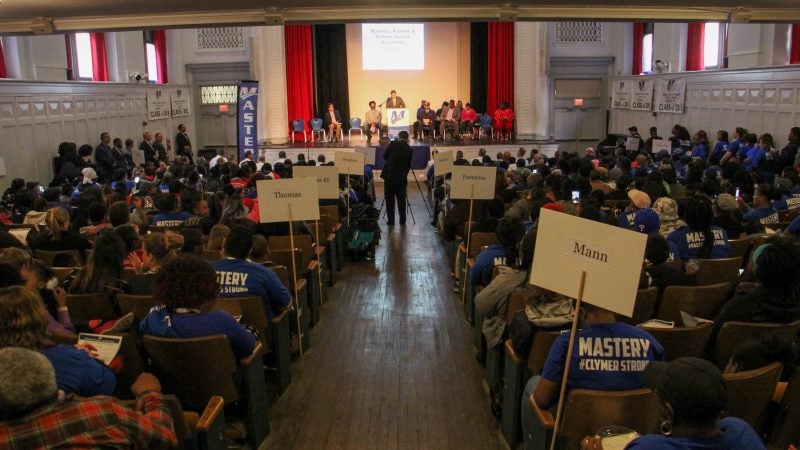 Hundreds of parents and students fill the auditorium at Mastery Shoemaker charter school for an assembly focused on reducing gun violence and funding charter schools. (Emma Lee/WHYY)