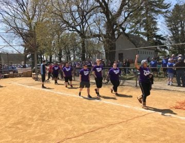 The Bad News Queers, one of 30 teams in the City of Brotherly Love Softball League, take the field in Philadelphia's Fairmount Park. (Shai Ben-Yaacov/WHYY)